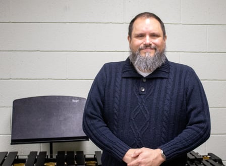 Martinez co directs the percussion ensemble